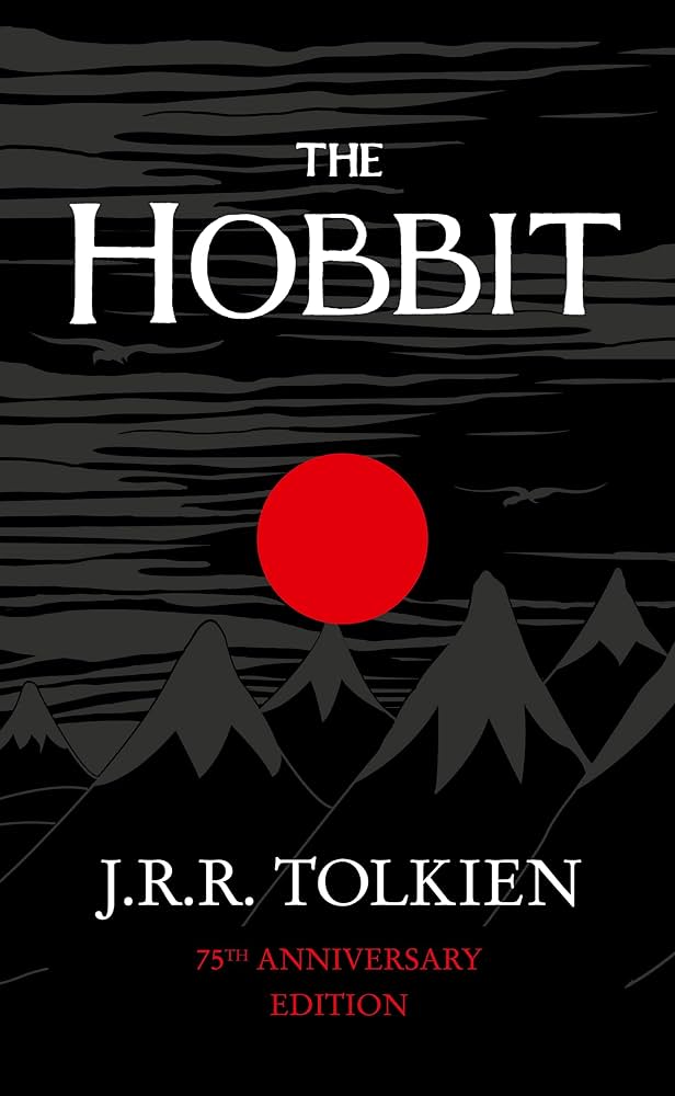 Book cover of The Hobbit shows a stylistic portrait of some mountains.